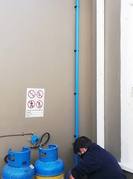 Storm water collection tank installation with drainage pump